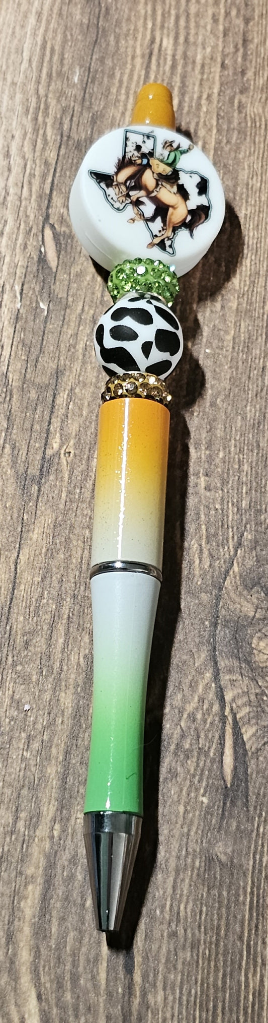 Orange, White, and Green Texas Rodeo Pen