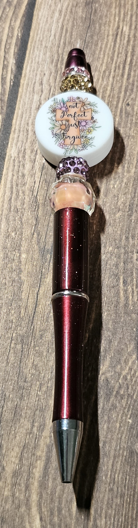 Maroon Religious Pen