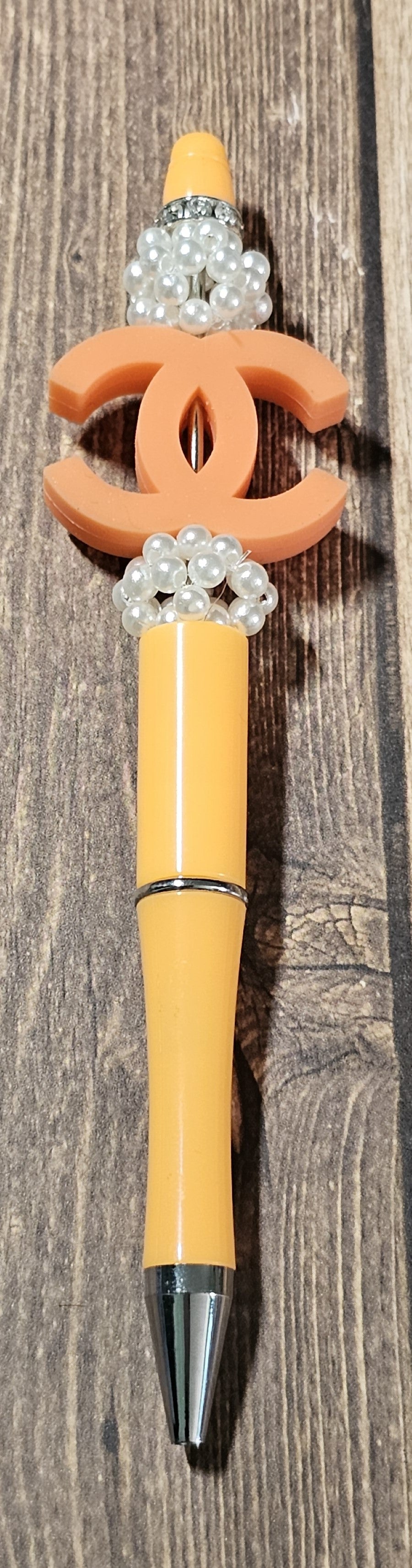 Orange with Pearl C's Pen