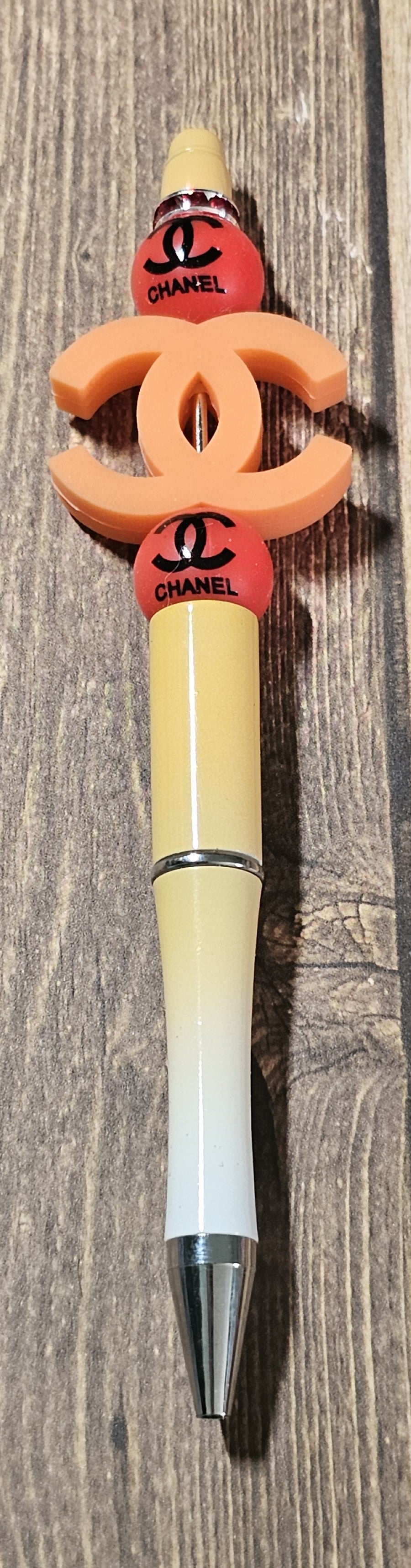 Orange, White, and Red, C's Pen