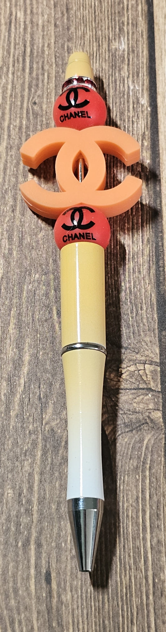 Orange, White, and Red, C's Pen