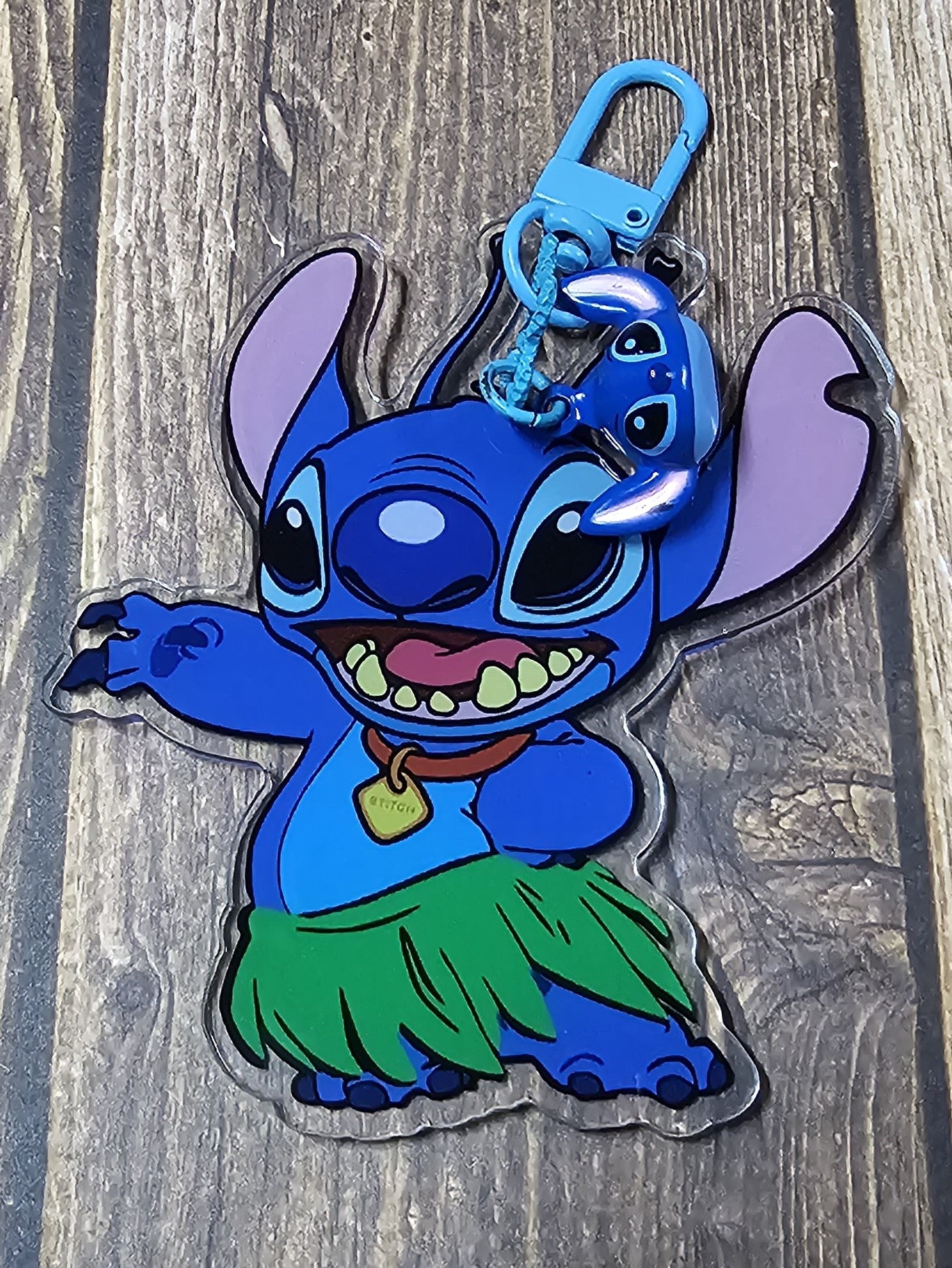 Blue Alien in a Hula Skirt Keychain with a Bell